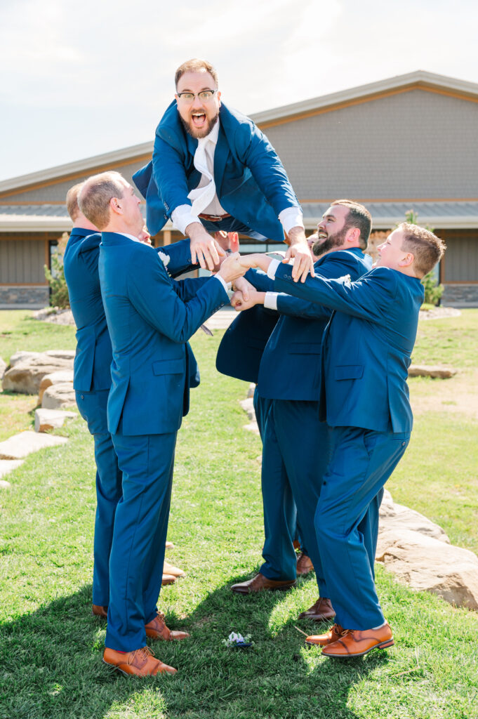groom and groomsmen having fun before lexington ceremony