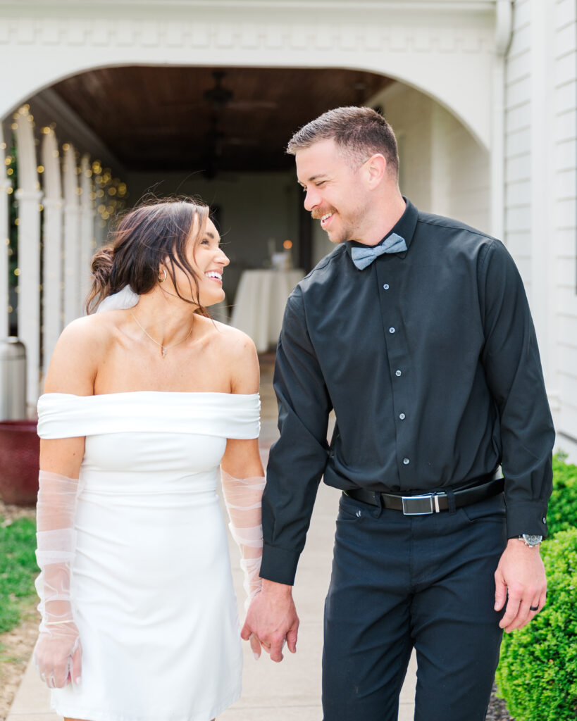 bride and groom laughing at lexington wedding
