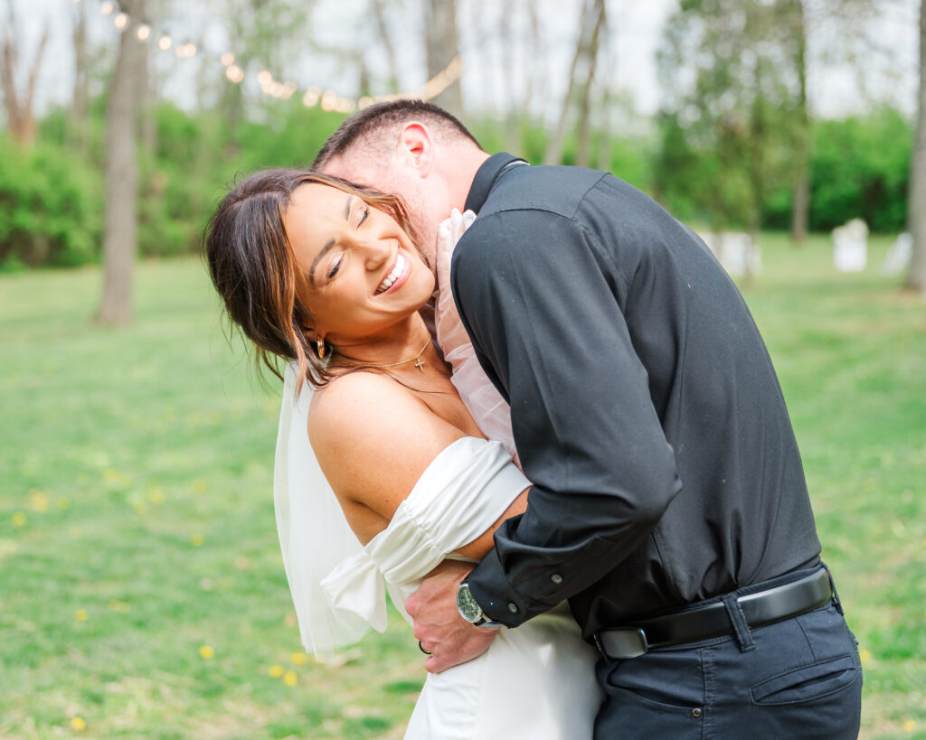 bride and groom laughing at lexington wedding venue