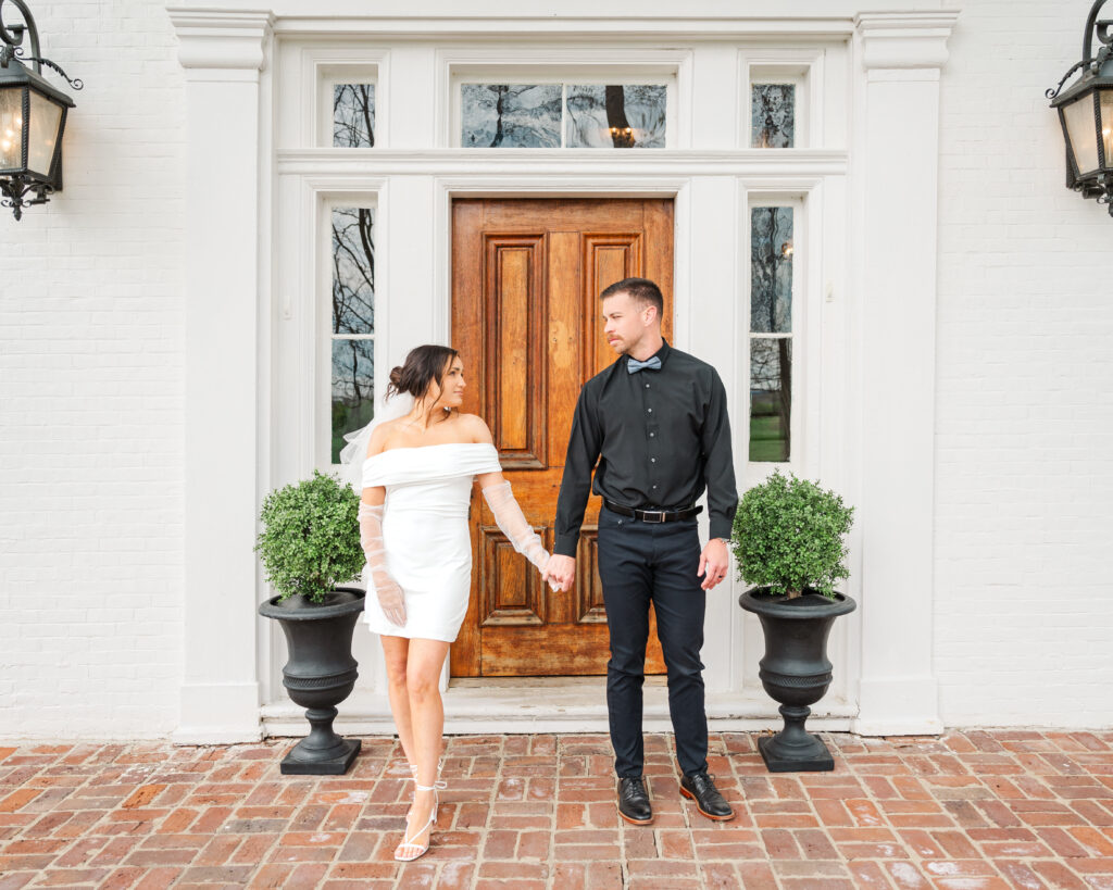 bride and groom looking back on lexington wedding day
