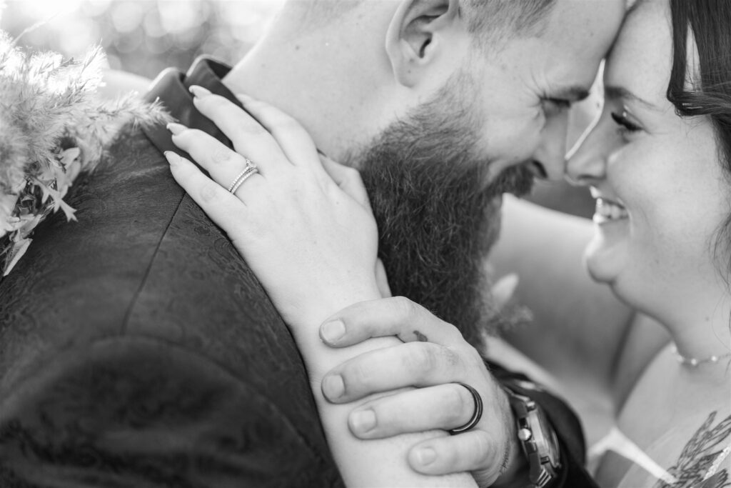 bride and groom close up of both rings during lexington wedding
