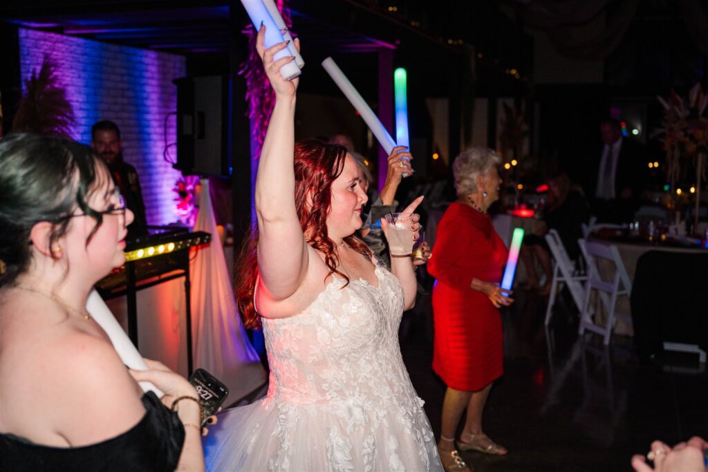bride having reception fun at lexington wedding